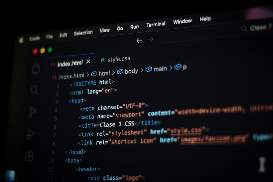 A computer screen displaying a code editor with HTML and CSS code visible, featuring elements such as the DOCTYPE declaration, HTML structure tags, meta tags, and a linked stylesheet. The interface in